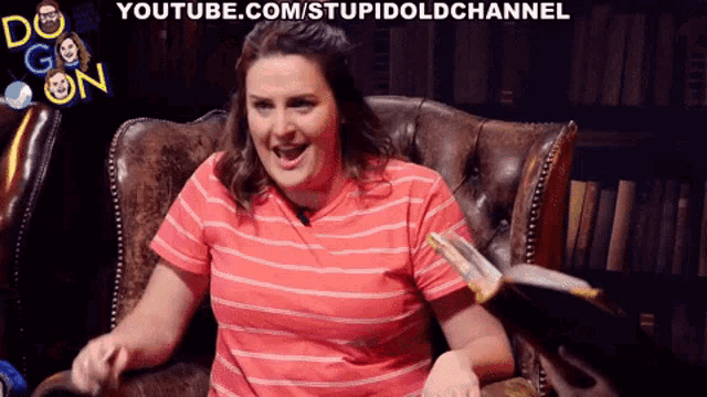 a woman sitting in a chair with youtube.com/stupidoldchannel written on the bottom right