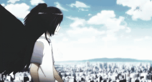 a person with black wings is standing in front of a crowd of people