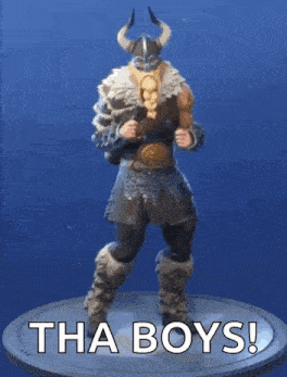 a viking is standing on a pedestal with the words tha boys ! written on it .