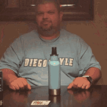 a man wearing a shirt that says diego style