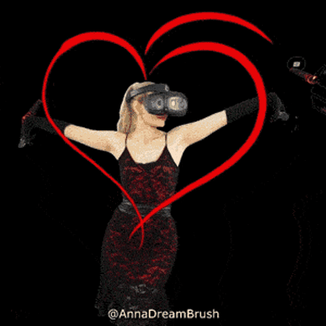 a woman wearing a virtual reality headset is standing in front of a heart