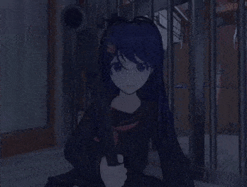 a girl with purple hair is behind bars in a prison cell .