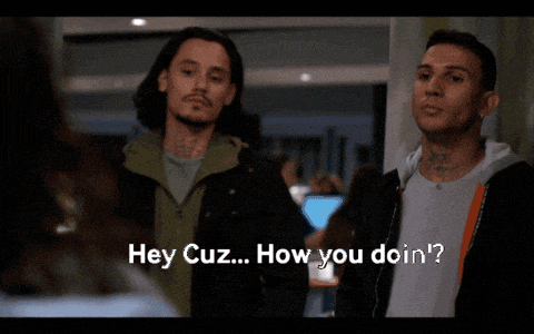 two men are standing next to each other and one of them says " hey cuz how you doin ' "