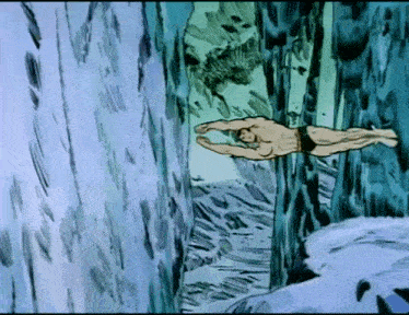 a man in a bathing suit is swimming in a cave