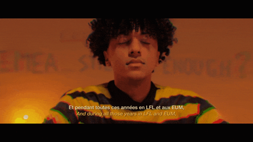 a man in a striped shirt with the words et pendant toutes ces années en lfl et aux eum