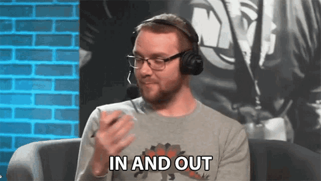 a man wearing headphones says " in and out "