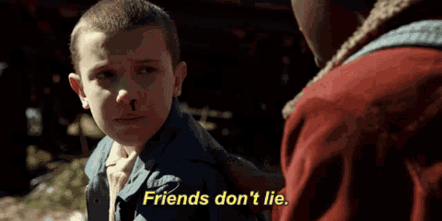 a young boy with a bloody nose is being comforted by a man who says friends don 't lie