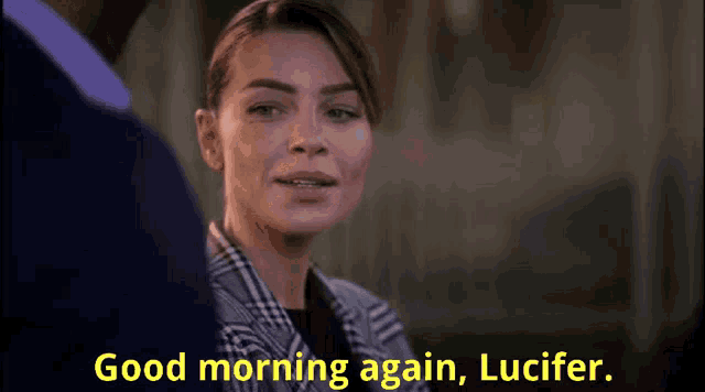 a woman says " good morning again lucifer " in front of a man