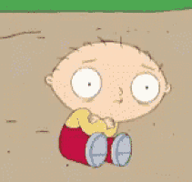 a cartoon character named stewie from family guy is sitting on the ground with his hands folded
