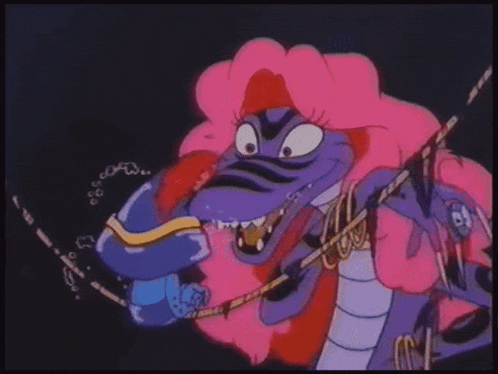 a purple and pink cartoon character with a star on his collar