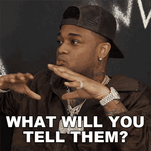 a man wearing a hat and a jacket says " what will you tell them "
