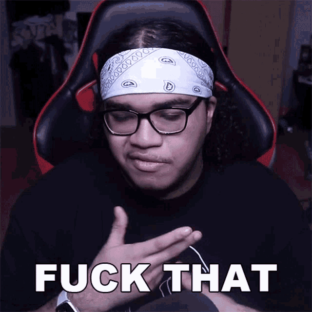 a man wearing glasses and a bandana with the words fuck that written on it