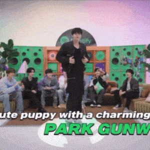 a man is standing in front of a group of people with the words " park gunw " on the bottom