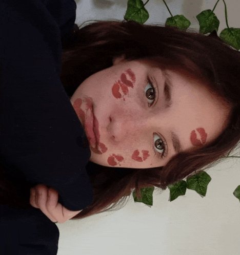 a woman with red lips on her face