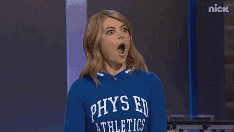 a woman in a blue phys ed athletics sweatshirt