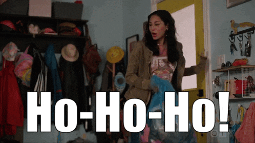 a woman standing in a room with the words ho-ho-ho written on the bottom