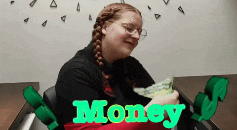 a girl is holding a bunch of money and the word money is behind her