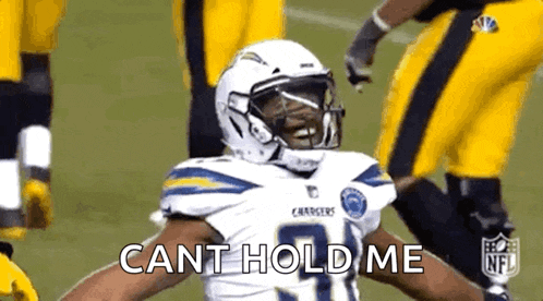 a football player in a chargers uniform says cant hold me .