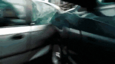 a close up of a car door with a broken window