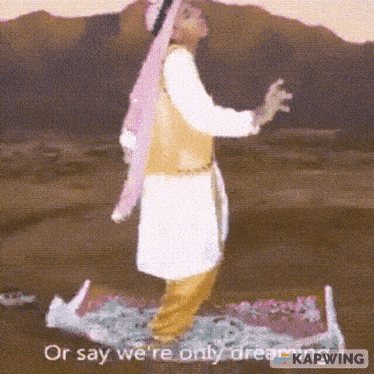 a man is standing on a carpet with the words or say we 're only dreaming