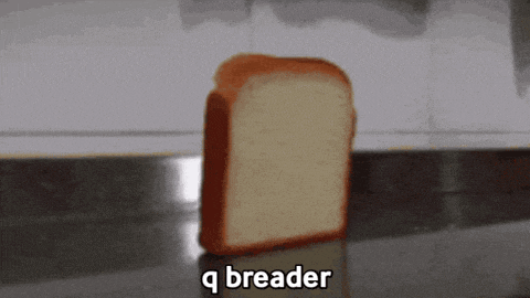 a slice of bread is sitting on a counter with the word breader below it