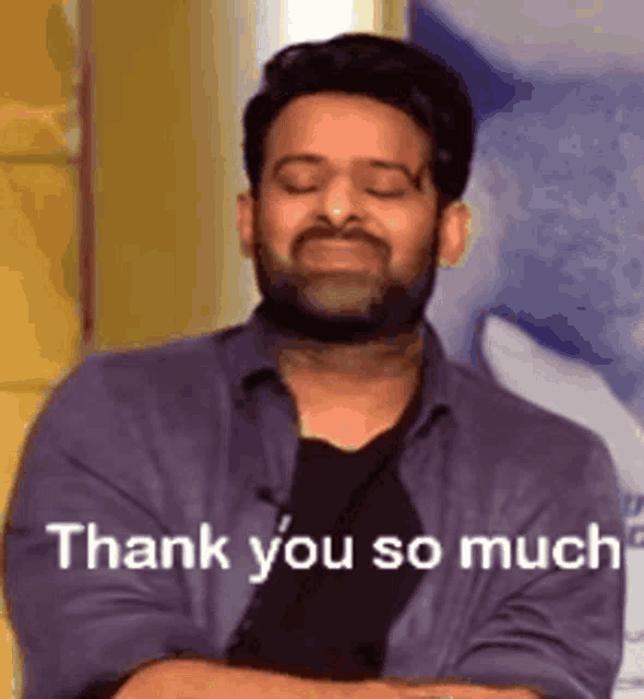 a man with his eyes closed is saying thank you so much
