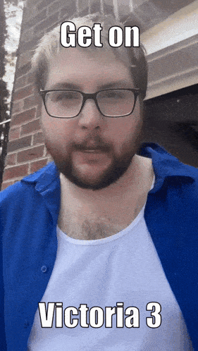 a man wearing glasses and a blue shirt says " get on victoria 3 "