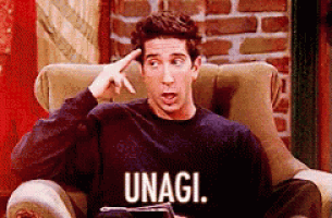 a man is sitting in a chair with his hand on his head and the words unagi written on the bottom