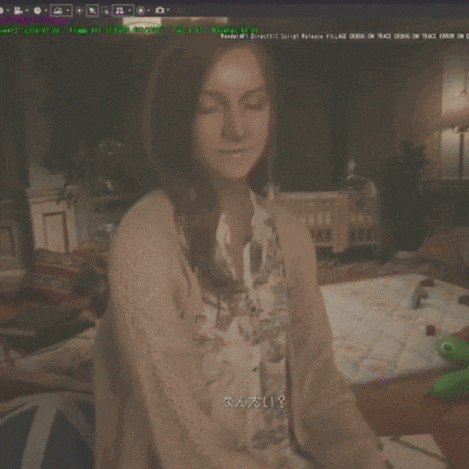 a woman is standing in front of a computer screen that says script release village debug on track debug on track error on d