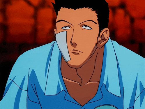 a cartoon man with a bandage on his face