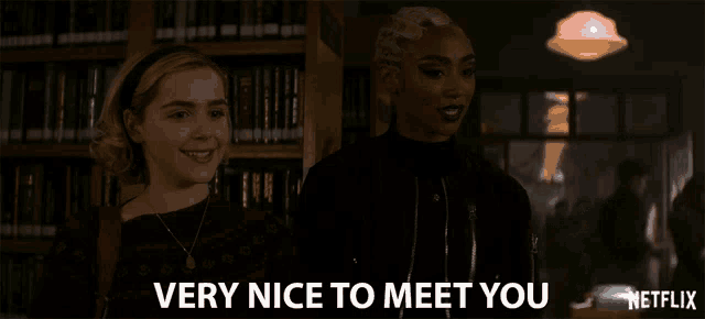 two women standing next to each other with the words very nice to meet you on the bottom