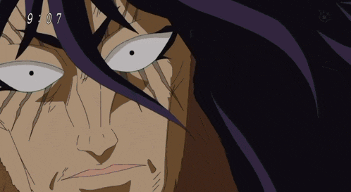 a close up of a man 's face with the numbers 9:07 visible