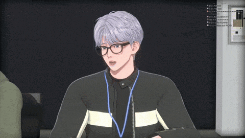 a man with glasses and a lanyard around his neck looks surprised