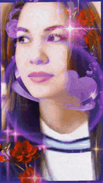 a woman 's face is surrounded by purple and red flowers