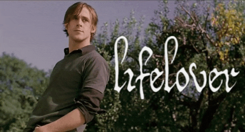 a man is standing in front of trees and the word lifelover is written on the bottom