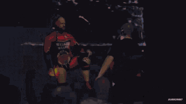 a wrestler in a walking weapon outfit is being photographed by a cameraman
