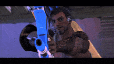 a man with a tattoo on his arm holds a blue gun