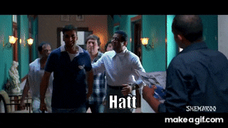 a group of men are standing in a room with the word hatt on the bottom