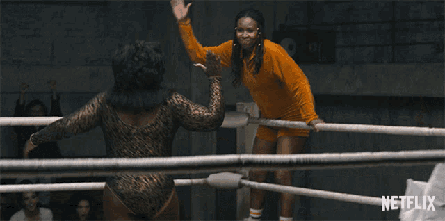 two women in a boxing ring with netflix written on the bottom right
