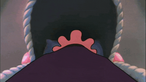 a close up of a cartoon crocodile 's mouth with its mouth open