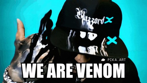 a person wearing a hat that says we are venom on it