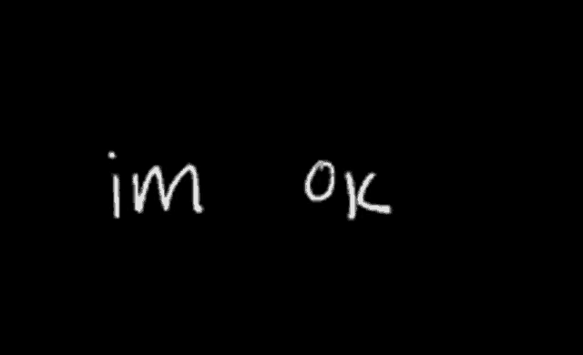 the word broken is written in chalk on a black board .