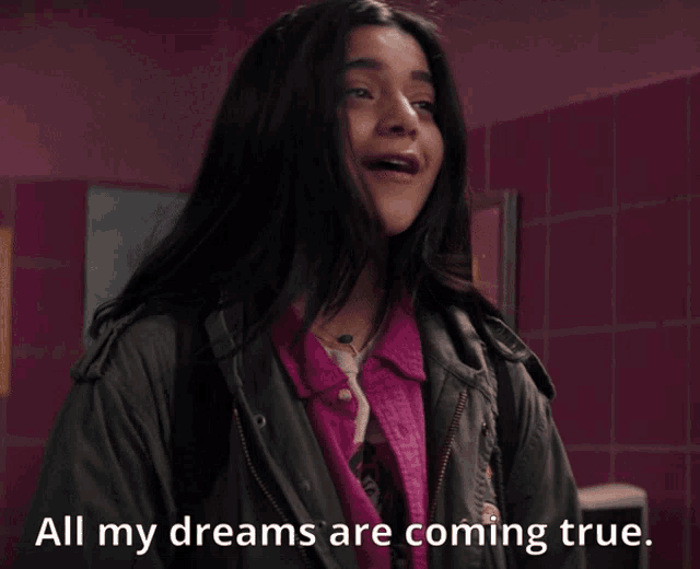 a girl in a green jacket says all my dreams are coming true
