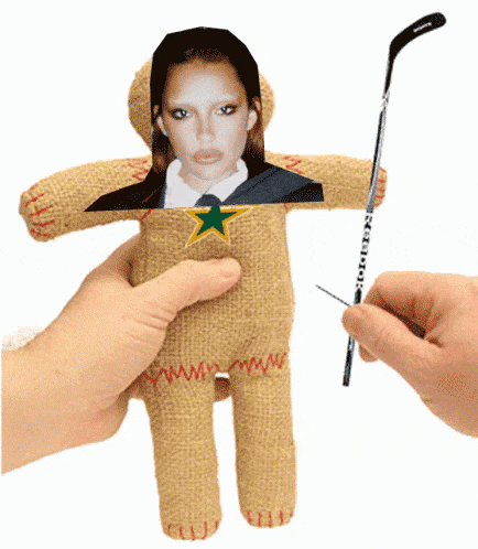 a gingerbread man with a picture of a woman and a hockey stick