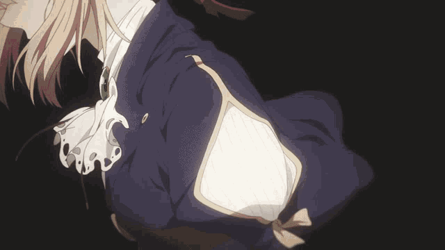a close up of a person 's arm with a purple jacket