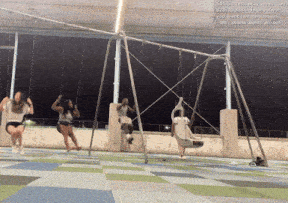a group of women are swinging on a set of swings with a caption that says $ 15 g subs