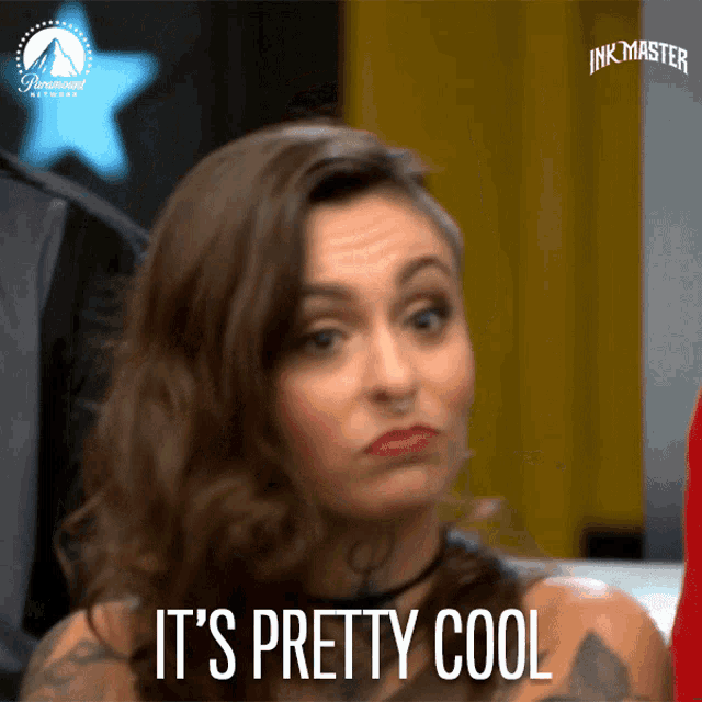 a woman says it 's pretty cool in front of a paramount logo
