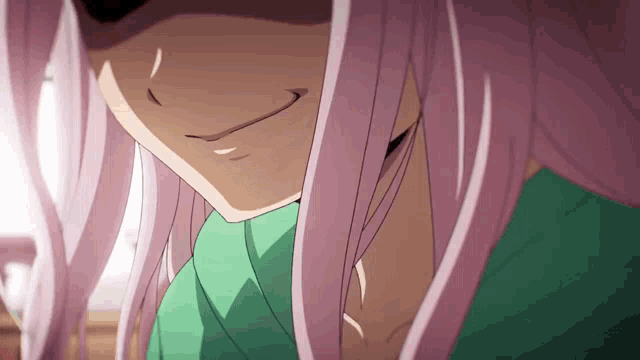 a close up of a girl with pink hair