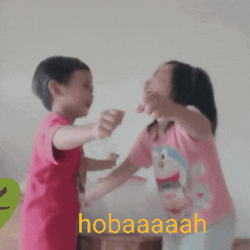 a boy and a girl are fighting with the word hobaaaah in the corner