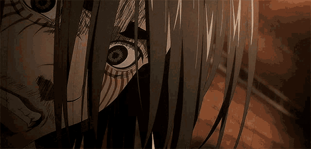 a close up of a person 's face with a very large eye